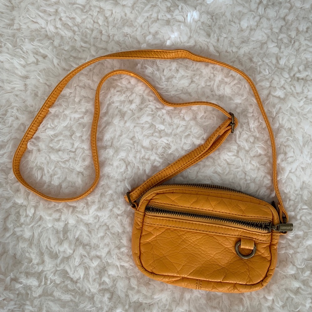 Small mustard purse from a boutique